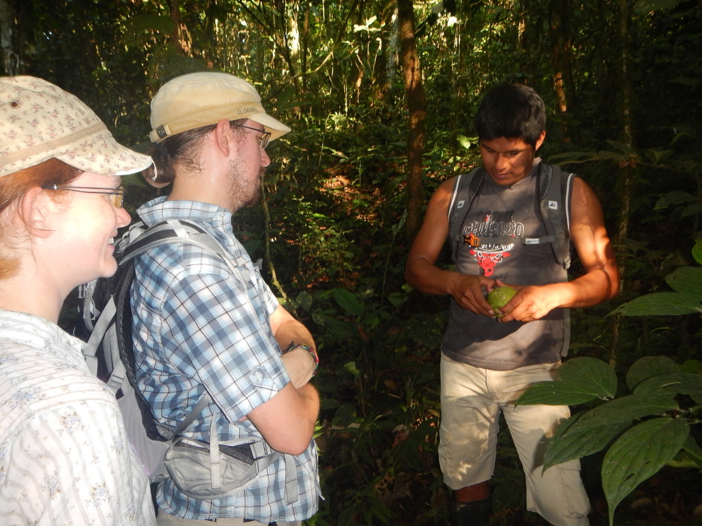 About to taste a jungle lemon, Chris looks sceptical