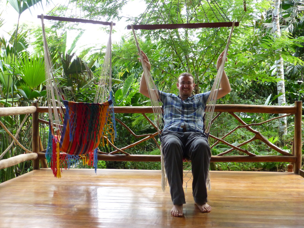 Chris enjoying the hammock seats in the school