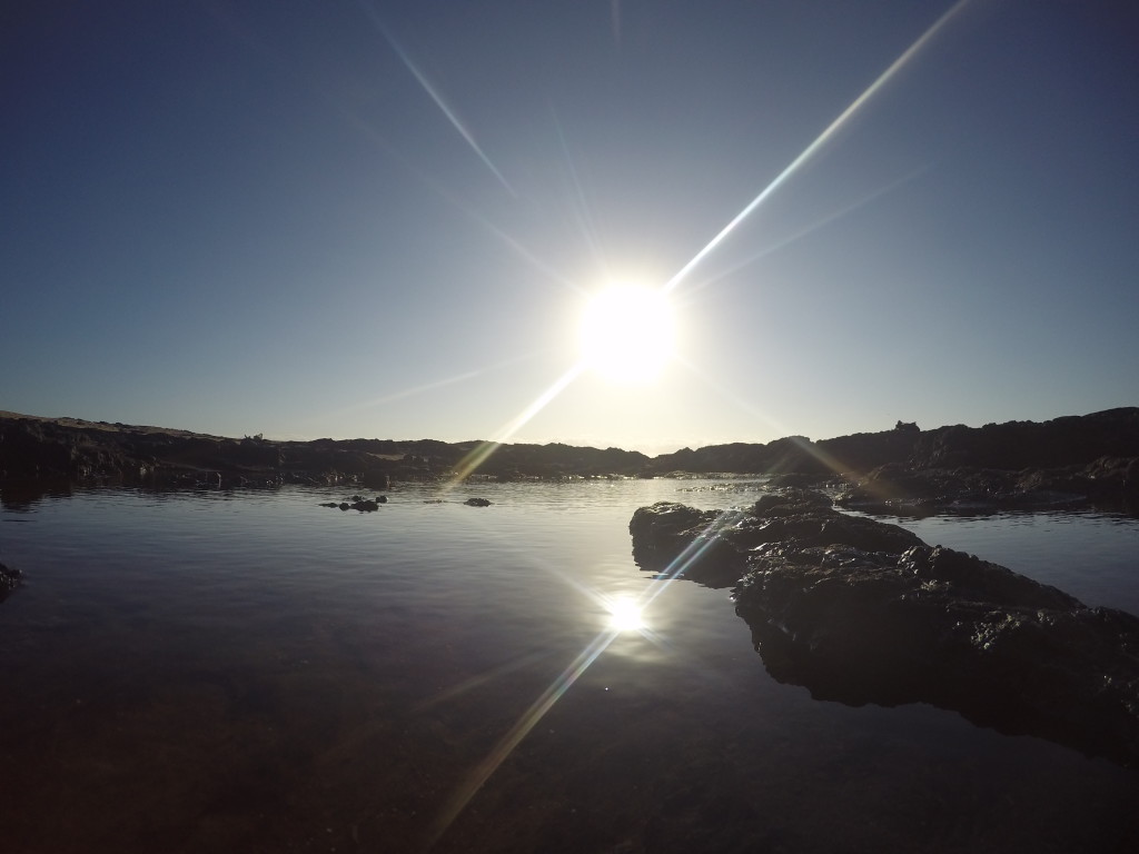 Sun over a volcanic lagoon