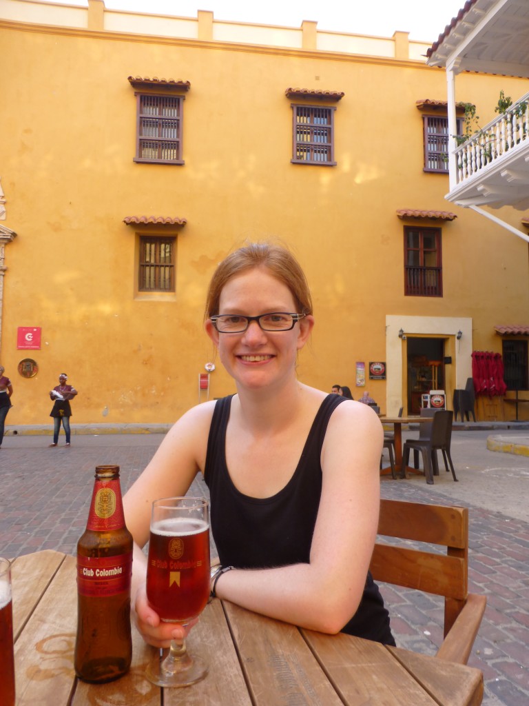Alex enjoys a Club Colombia in Plaza Santo Domingo, Cartagena