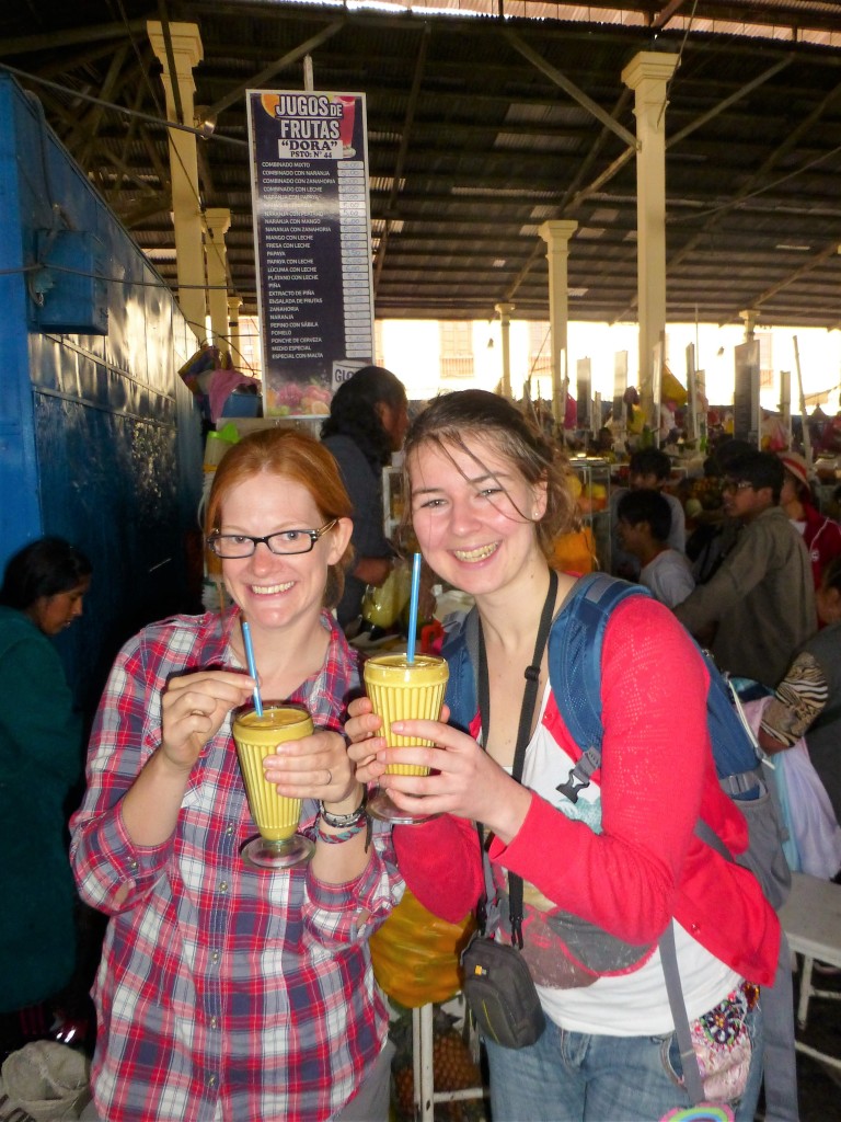 Sampling juice at the San Pedro market
