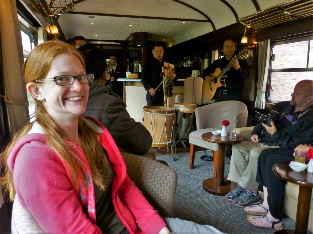 Alex looking slightly uncomfortable whilst the tourist band play