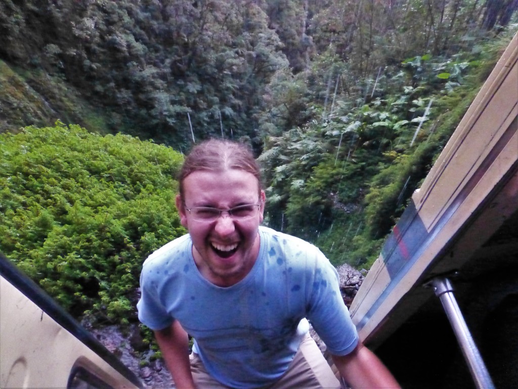 Leaning out of the bus on Death Road