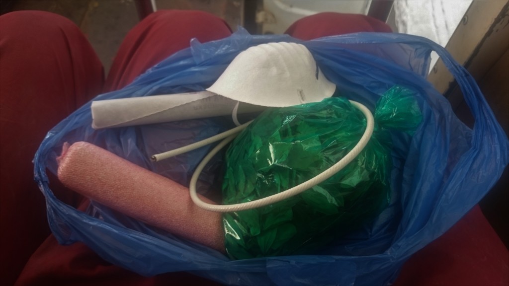TNT, Ammonium Nitrate, Fuse, Coca Leaves and a Mask