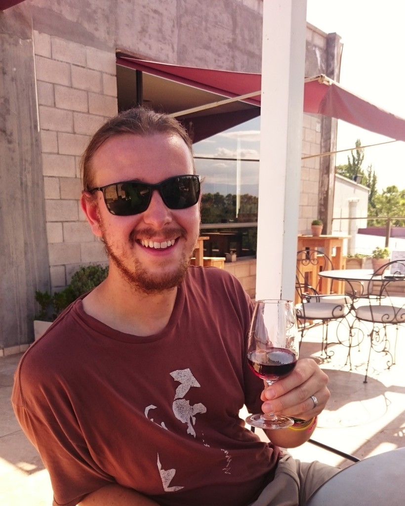 Enjoying a glass of red at Tempus Alba