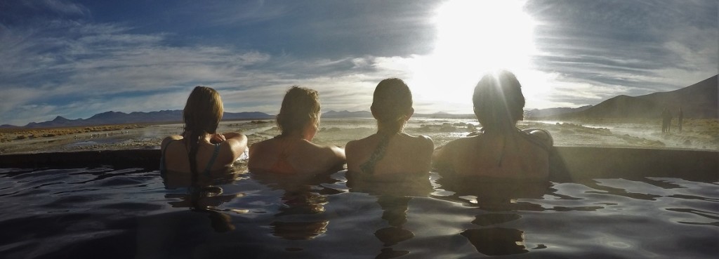 The girls stare out into the desert