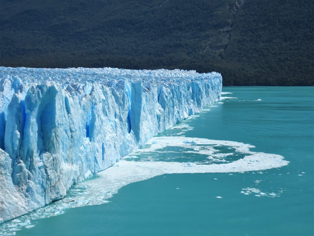 Huge chunks of ice falling from the glacier