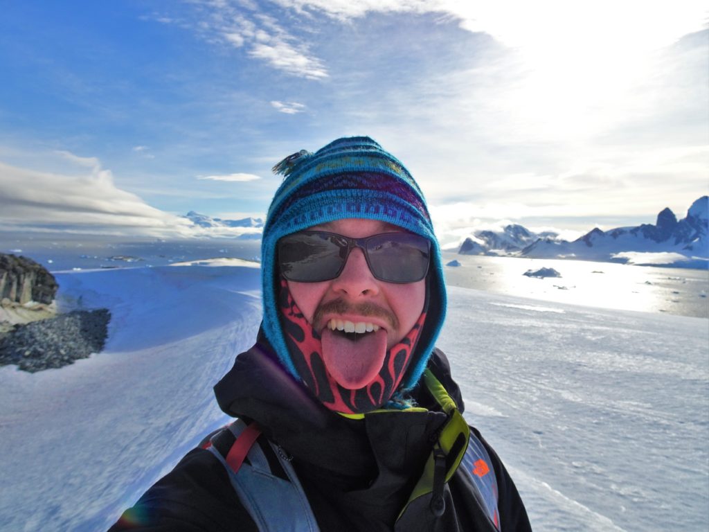Chris having just climbed a mountain on Antarctica!