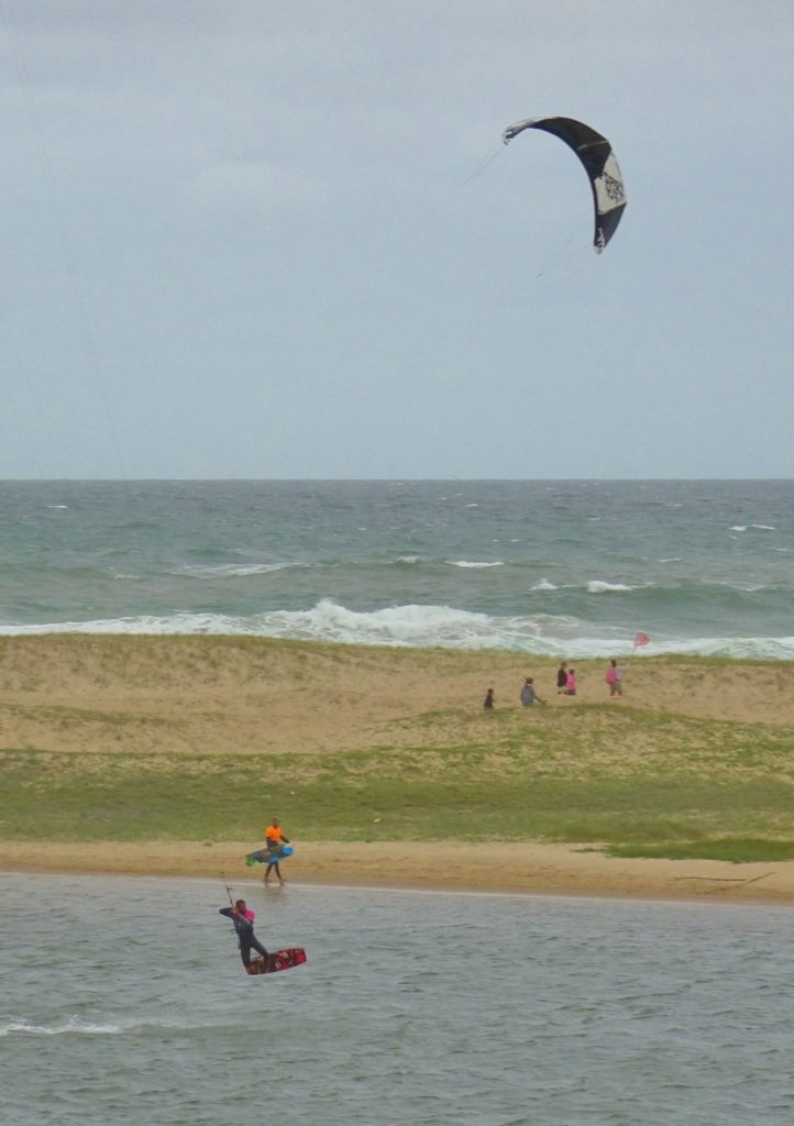 Kite surfer jumping