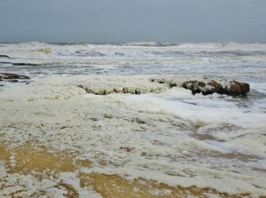 Amazing foam blowing in from the sea