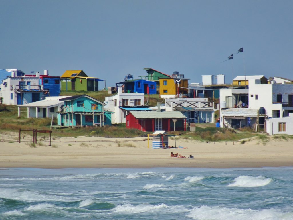 The brightly painted beach houses of Cabo Polonio